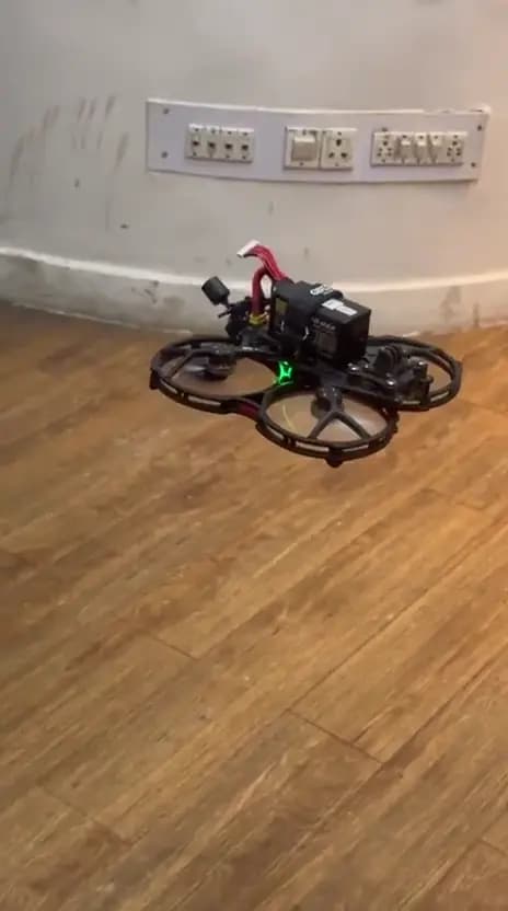 An FPV cinewhoop drone on a test flight